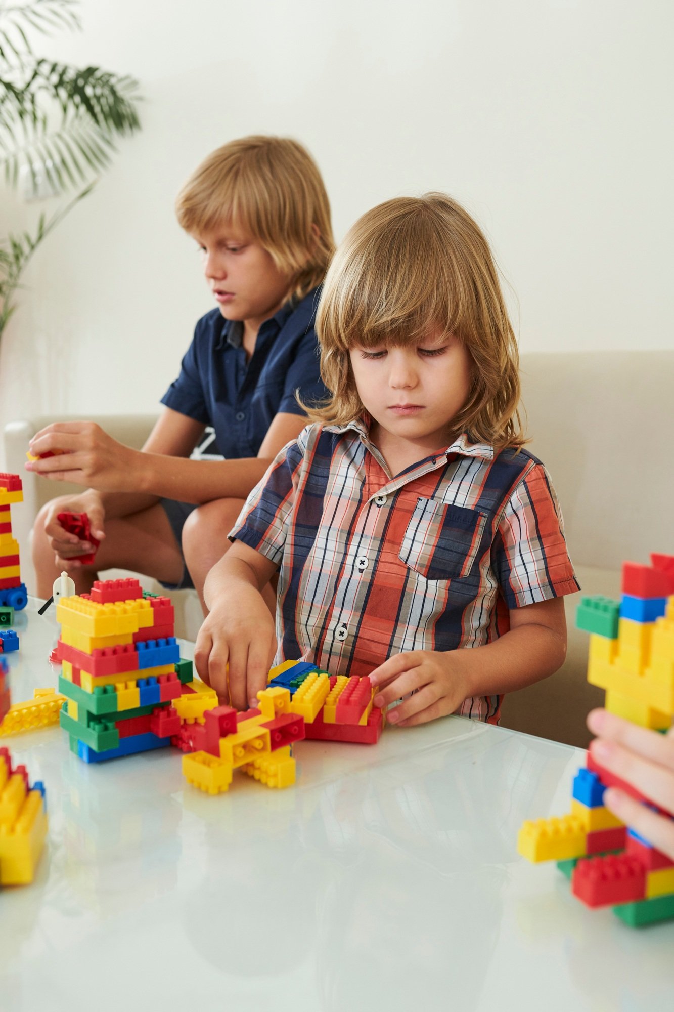 Preschool Boy Building Towers